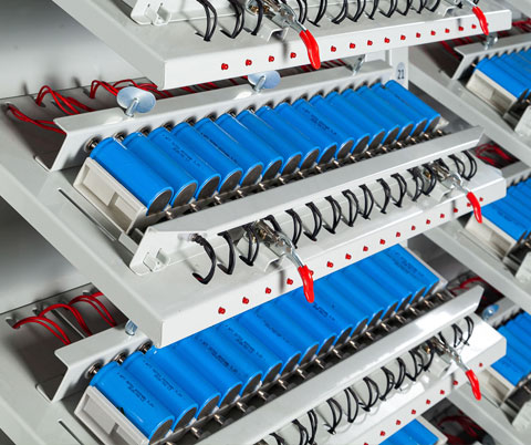 What is the function of a battery aging machine